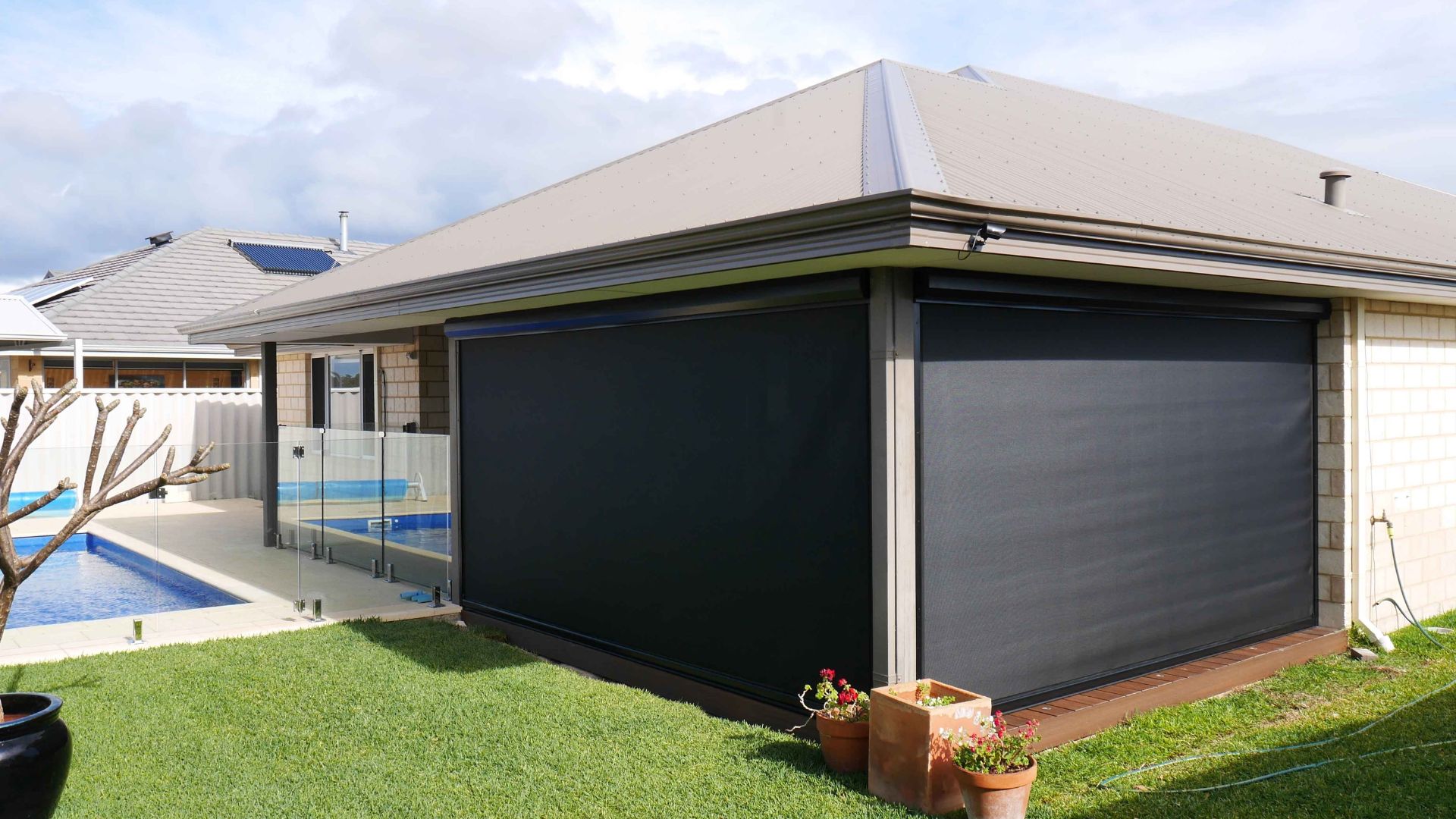 Ziptrak blinds installed in a backyard in Perth