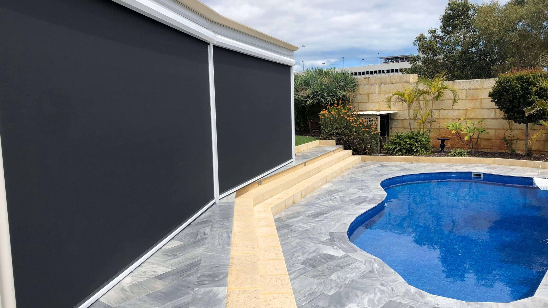 Outdoor blinds by the pool