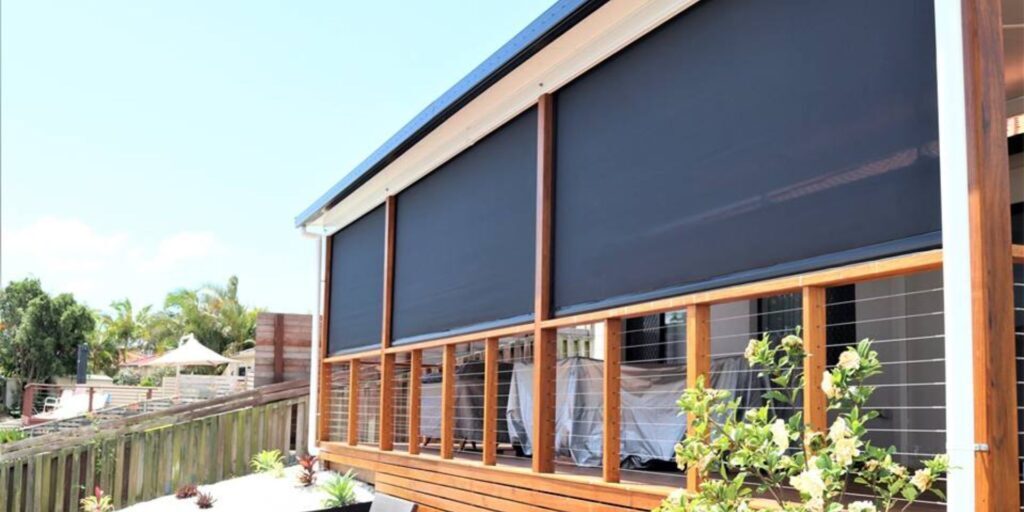 Ziptrak outdoor blinds installed on the end of a deck