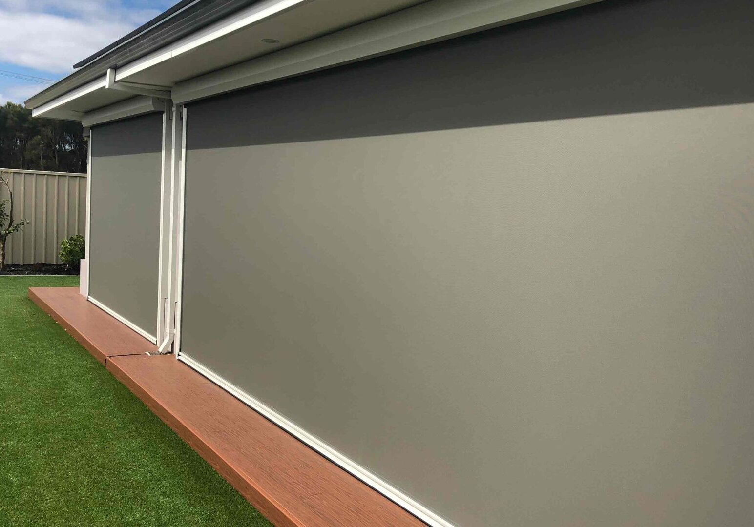 Ourdoor blinds in a backyard
